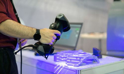 Reverse engineering concept: Engineer use 3d scanner scan work piece for tranfer to CAD file.